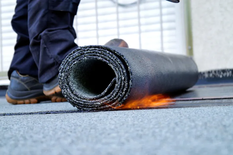 
bitumen dak branden